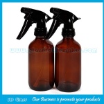 16oz Amber Boston Round Glass Bottle With Black Trigger Sprayer