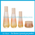New Items 40ml,100ml,120ml,50g Colored Glass Lotion Bottles And Cosmetic Jars With Wood Caps For Skincare