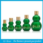 绿色喷涂双葫芦精油瓶和配套盖子