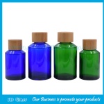 100ml and 120ml Blue and Green Sloping Shoulder Glass Lotion Bottles With Bamboo Caps