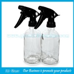 16oz Clear Boston Round Glass Bottle With Black Trigger Sprayer